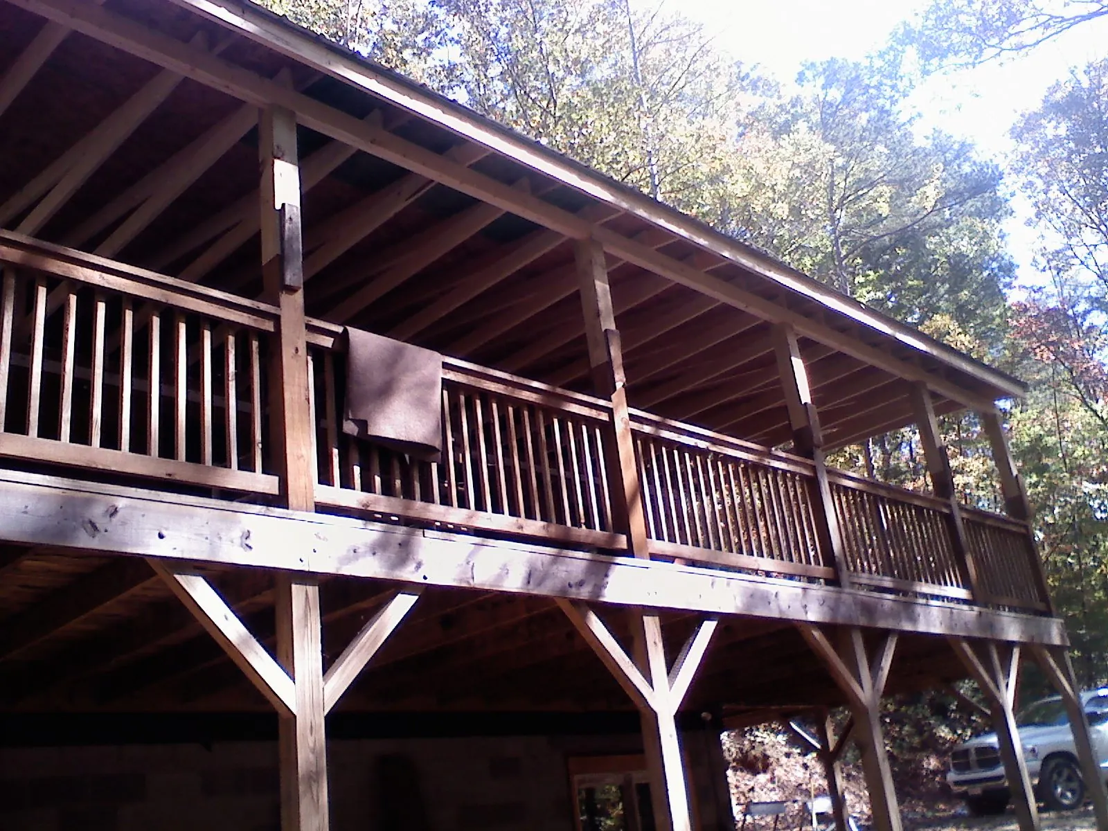 Timber framing under a new elevated porch and deck — Roof Leak Repair in Hustisford by Roofing Brothers